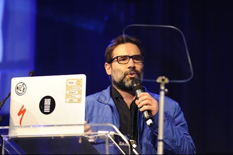 Adam Buxton entertaining the audience at the PayPal Etail Awards 2013